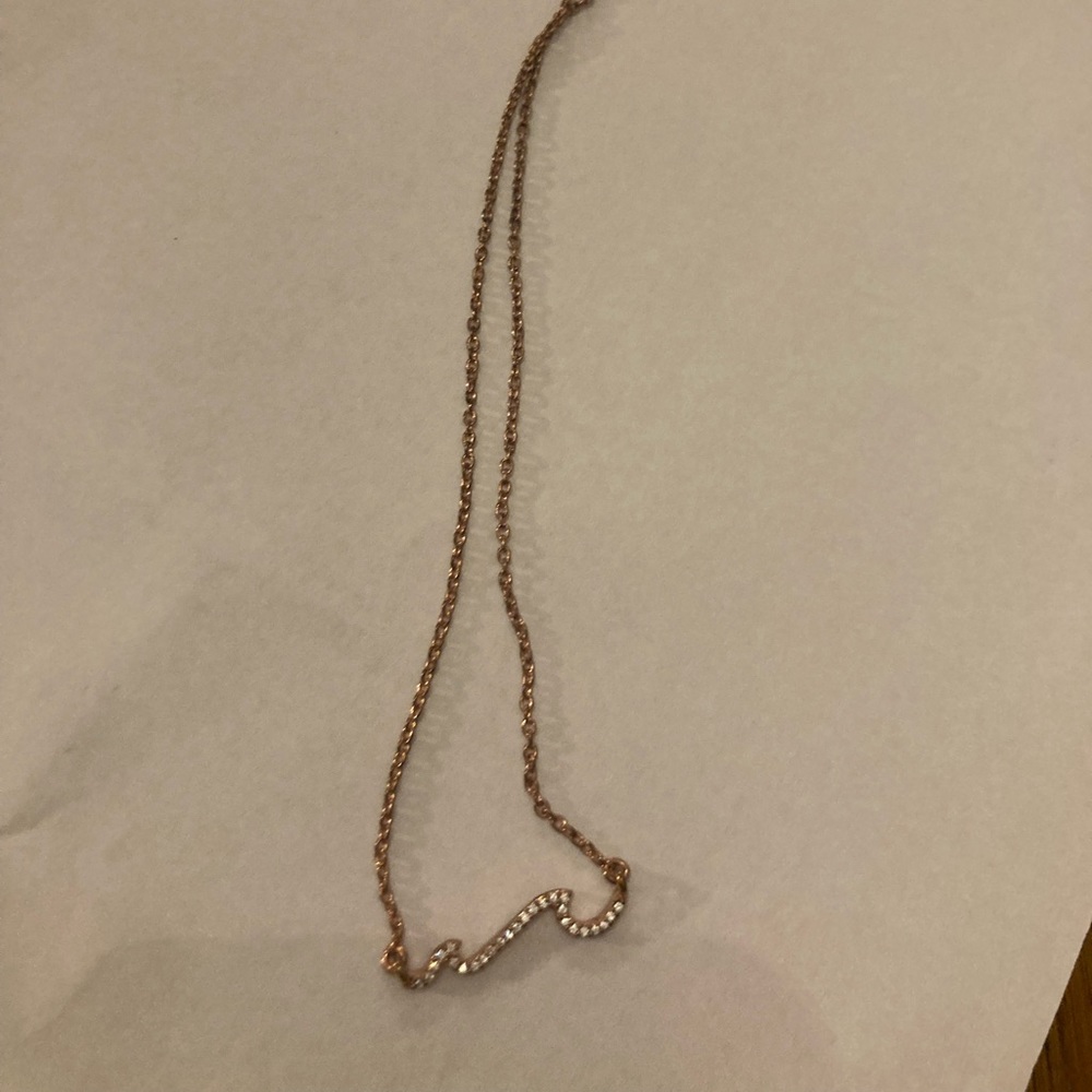 Pure vida pace wave necklace in rose gold.
